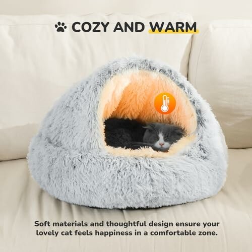 Cat sleeping in a fluffy dome-shaped bed with text 'Cozy and Warm'.